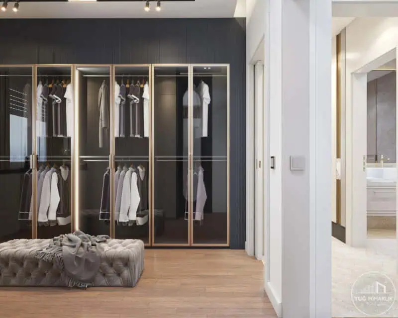 Giyinme odası dolaplar, oval ayna ve kapitone orta puf – Tuğ Mimarlık