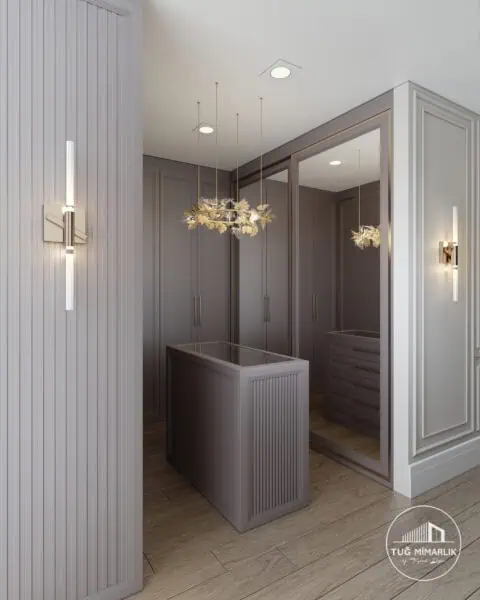 U Şekilli giyinme odası – ada ve aynalı kapak kurgusu - tuğ mimarlık U şekilli dolap yerleşimi ve ada çekmeceli çözümle Manzara Adalar Kartal giyinme odası tasarımı