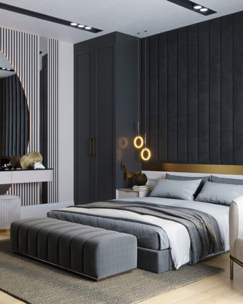 Acarkent villa yatak odasında siyah panel başlık duvarı, makyaj masası ve modern aydınlatma tasarımı