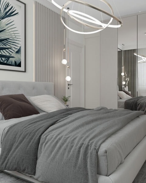 Göztepe yatak odasında aynalı gardırop, döşemeli yatak ve modern tavan aydınlatması ile şık iç mimari çözüm