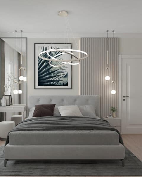 Göztepe yatak odasında döşemeli yatak, panel duvar, makyaj masası ve sarkıt aydınlatmalarla modern iç mimari tasarım