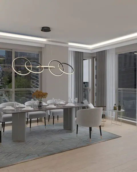 Kalamış modern salon oturma alanı geniş koltuk ve dekoratif aydınlatma