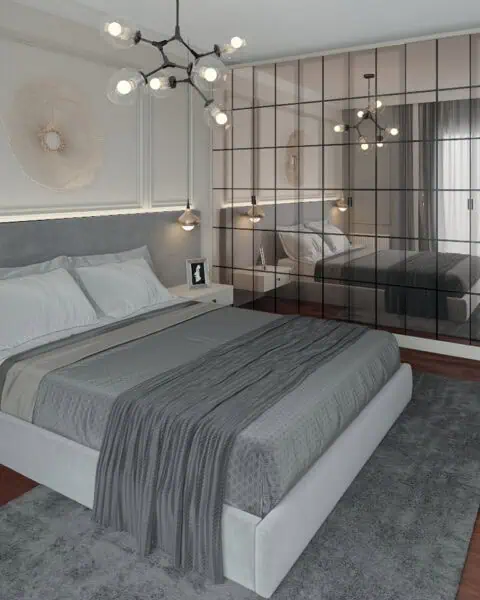 Feneryolu ayna kapaklı yatak odasında gardırop cephesi ve yatak görünümü