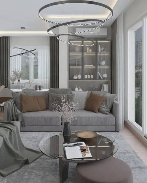 Göztepe salon genel görünümü - tuğ mimarlık Göztepe salon tasarımında modern halka aydınlatma, geniş pencere, oturma alanı ve vitrin detaylarıyla şık iç mimari çözüm