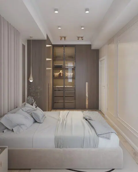 Küçükyalı yatak odasında kumaş yatak başlığı, ahşap gardırop ve cam kapaklı dolap bölümü tasarlandı