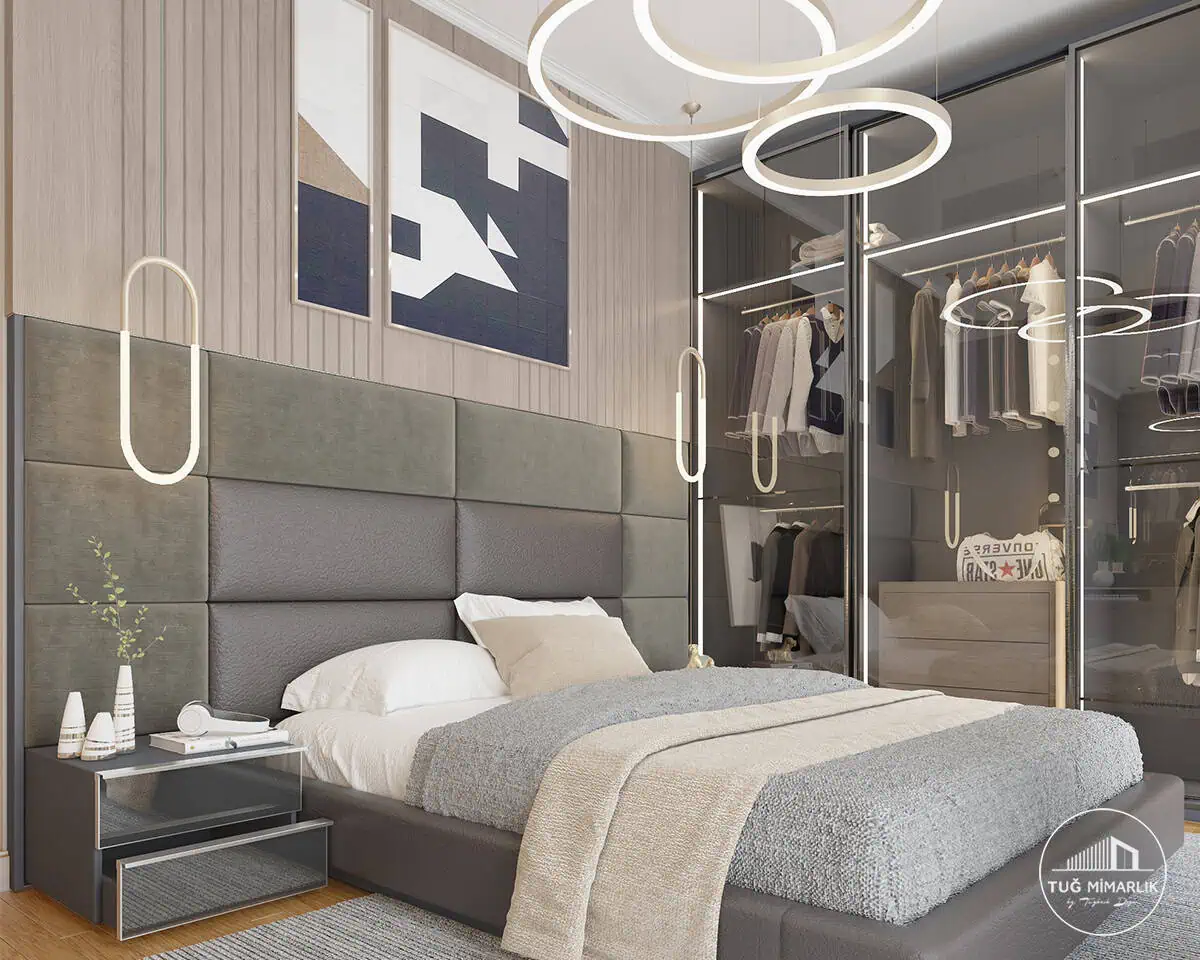 Nef koruköy yatak başlığı ve gardırop - tuğ mimarlık Nef Koruköy yatak odasında döşemeli panel duvar, cam kapak gardırop ve modern sarkıt aydınlatma detayları