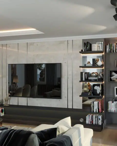 Ulus salonda taş görünümlü TV duvarı ve açık raflı kitaplık tasarımı