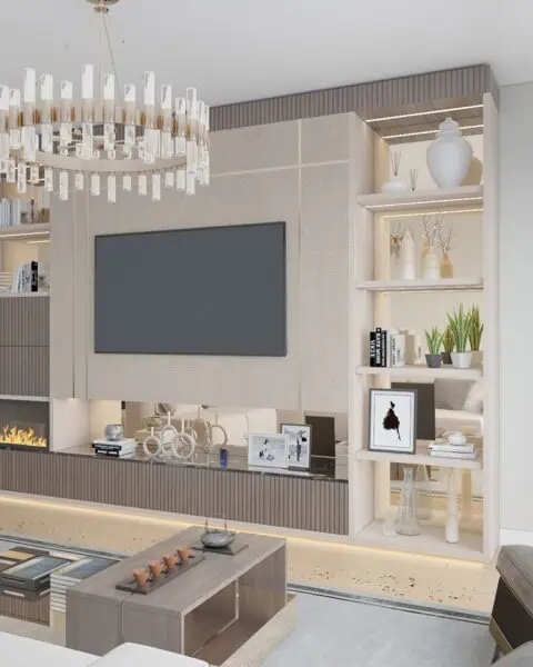 Vadistanbul Park salonunda büyük tv paneli, açık raflar ve şömine bulunan duvar ünitesi